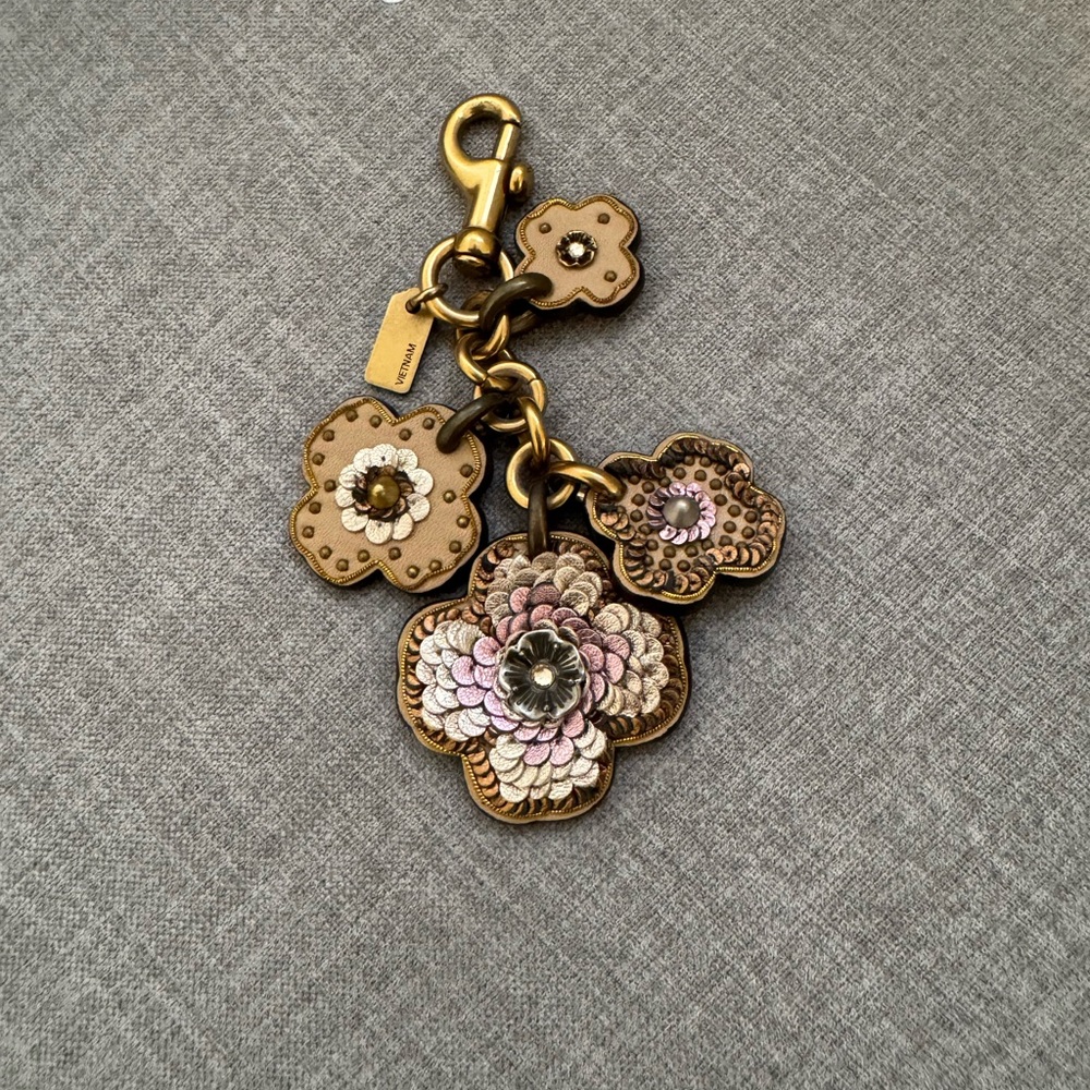 Coach Floral Keychain with Gold and Brown Accents